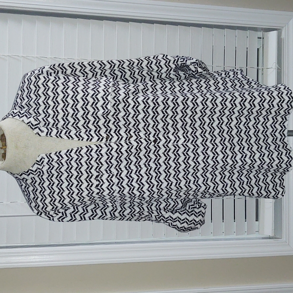 Ivanka Trump Ladies dress blouse. Black and white with designs. Size medium.